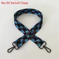Detail of adjustable blue and black ethnic floral strap with gunmetal swivel hooks - No. 94 Gunmetal Buckle