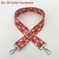 Close-up of ethnic adjustable bag strap with orange fish pattern and golden metal hooks - Style 58 Gold Buckle