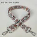 Close-up of bohemian style woven bag strap with blue floral pattern and silver buckle - No. 34 Silver Buckle