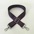 Close-up of Style 100 woven bag strap with red and blue geometric patterns and silver buckles - No. 100 Silver Buckle