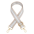 Dettaglio della tracolla regolabile champagne con strisce argento e ganci in metallo oro - Beige / Chiusura in Argento