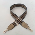 Detail of adjustable canvas strap with coffee brown stripes and gold metal swivel hooks - Khaki Strap + Khaki Leather