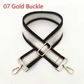 Close-up of black, white and gold striped wide shoulder strap with golden metal buckle - Style 07 Gold Hardware