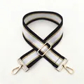 Detail of adjustable black and white striped woven bag strap with metal buckle - Style 07 Silver Hardware