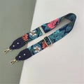 Close-up of adjustable floral strap with golden lobster clasps and blue leather details - Blue Floral + Blue Leather