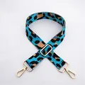 Close-up of light blue leopard print bag strap with golden metal swivel hooks and buckle - Light Blue