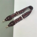 Close-up of adjustable leopard print bag strap with high-quality metal lobster clasps - Leopard + Coffee Leather