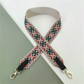 Close-up of ethnic geometric pattern fabric strap with premium gold metal swivel hooks - Rice White Flower