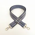 Close-up of ethnic geometric pattern cotton strap with gold metal hooks and buckle - Style 9