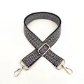 Detail of adjustable woven shoulder strap with blue V-pattern and gold metal lobster clasps - Style 11