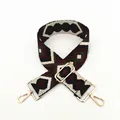 Detail of adjustable geometric diamond pattern shoulder strap with gold metal lobster clasps - Coffee Diamond Pattern (No. 6)