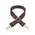 Close-up of adjustable woven shoulder strap with geometric patterns and gold metal buckles - No. 27 Nude Pink