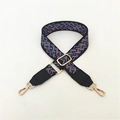 Close-up of adjustable woven shoulder strap with geometric patterns and golden metal clasps - Rhombus Pattern with Black Leather