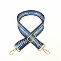 Detail view of ethnic bohemian woven purse strap with gold metal swivel hooks and hardware - Silver Clasp / Light Blue Argyle