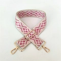 Detail of adjustable ethnic style woven strap with geometric patterns and gold metal hooks - Pink Floral Pattern