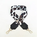 Detailed view of adjustable leopard print bag strap with golden metal swivel hooks - White Coffee