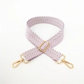 Close-up of lilac woven herringbone purse strap with polished gold metal buckles - Light Purple