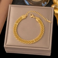 Elegante pulsera trenzada dorada de varios hilos con cierre de langosta y dije ajustable - Pulsera de malla de 6 mm / Dorado