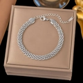 Elegant multi-strand silver braided snake chain bracelet with polished finish - 6mm Mesh Bracelet / Steel