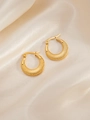 Detailed close-up of golden hoop earrings featuring textured mesh patterns on silk fabric - Grid Embossed Hoop Style (BJGE0244)