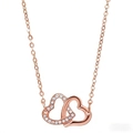 Collier élégant en or rose avec deux cœurs entrelacés et pierres de zircone cubique - Collier / Or rose