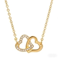 Élégant collier doré à double cœur entrelacé avec des strass blancs étincelants - Collier / Or