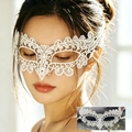 Elegant white lace masquerade mask with intricate hollow floral embroidery and ribbon tie - White