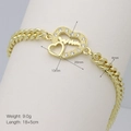 Detail eines goldenen Panzerarmbands mit Herzanhänger und 18+5cm verstellbarer Länge - Herzschlaglinie Herz (DB241210-B)