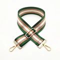 Détail d'une bandoulière réglable à rayures vertes et blanches avec des touches or rose - Vert