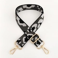 Detail of adjustable leopard print bag strap with polished gold-tone metal hooks - Antique Brass Buckle / Leopard Gray (Gold Thread)