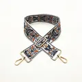 Close-up of adjustable ethnic embroidered bag strap with golden metal lobster clasps - No. 59