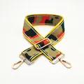 Close-up of adjustable camo shoulder strap with gold metal hooks and colorful weaving - US 3