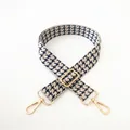 Close-up of houndstooth replacement bag strap with adjustable gold-tone metal buckles - Beige Blue