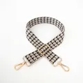 Adjustable houndstooth bag strap with golden metal swivel hooks and thick webbing texture - Beige-Black