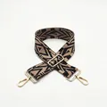 Detailed view of ethnic style jacquard bag strap with golden metal hooks and buckle - No. 2 Khaki
