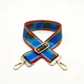 Adjustable camouflage bag strap with blue and brown patterns and gold metal hooks - US 9