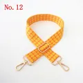 Detail of adjustable yellow houndstooth woven bag strap with light gold metal swivel hooks - Bright Yellow