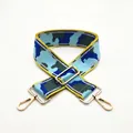 Adjustable camouflage canvas bag strap with golden metal hooks and blue green pattern - US 12
