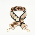 Close-up of bohemian style geometric diamond pattern woven bag strap with gold buckle - Dark Grey Pink No.65