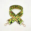 Close-up of leopard print bag strap in neon green and brown with golden metal clasps - Neon Green Leopard (Style 24)