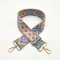 Detail of bohemian geometric diamond woven purse strap with gold metal lobster clasps - Lake Blue Purple Pink No.67
