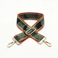 Detail of adjustable camouflage bag strap with durable golden metal lobster clasps - Size 16