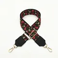 Detail of floral embroidered wide bag strap with black leather ends and gold metal buckles - Black Base Green Edge Red Floral Style (No. 8)