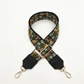 Detail of floral ethnic embroidery on black wide strap with gold metal swivel hook - Black Base Yellow Blue Green Floral Style (No. 9)