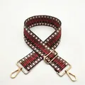 Dettaglio della tracolla tessuta regolabile n. 26 con motivo jacquard rétro e fibbie dorate - Chiusura in Argento / Marrone Scuro (N. 26)