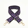Detail view of woven shoulder strap with red, white, blue wavy pattern and gold clasps - No. 10 Purple