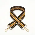 Close-up of wide woven bag strap with golden metal lobster clasps and geometric pattern - Dark Yellow (B8)