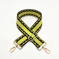 Close-up of wide geometric pattern bag strap with gold metal rotating hooks - Silver Clasp / Yellow (B9)