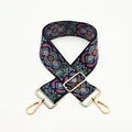Close-up of ethnic style paisley pattern bag strap with adjustable gold metal buckles - Pattern A6