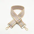 Detail of jacquard woven strap with pink and blue geometric patterns and gold hardware - Pink (B16)